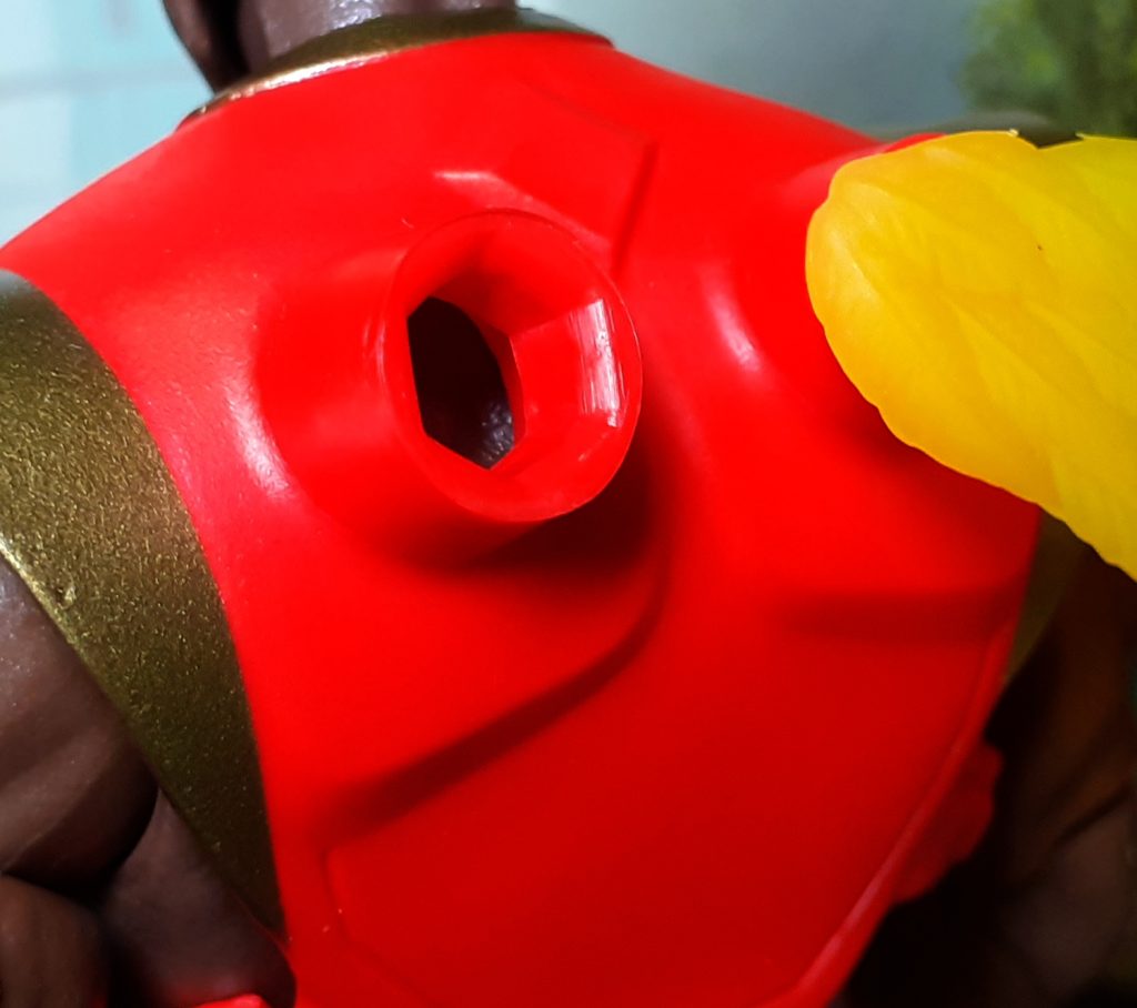 The back of Sun-Man's armour with one of the wings removed. This shows the raised hole in the armour where a pin on the wing can slot in.