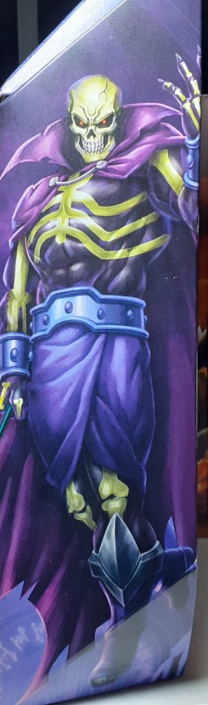 The box art from the side of Scare Glow's box. In this piece, Scare Glow is walking towards the viewer while holding up his left hand in an almost beckoning gesture.