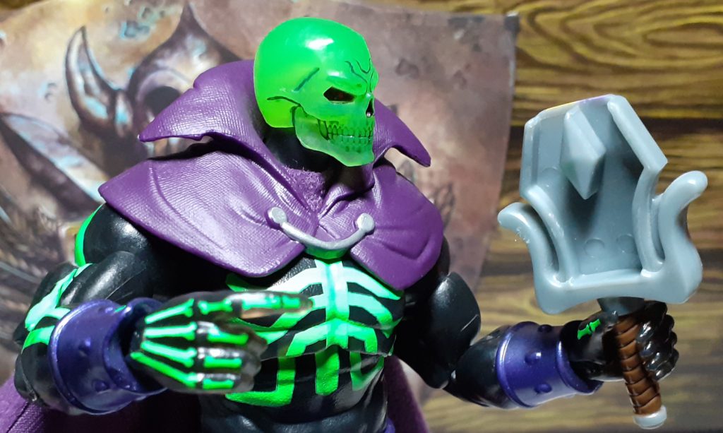 The Scare Glow figure with the empty hilt of the Sword of Power. The two blade halves have been removed and the hilt looks very odd with out them.