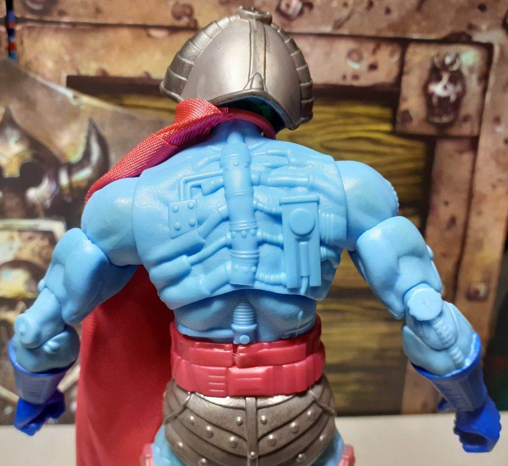 A closer look at the cybernetic details on the back of the New Adventures Skeletor figure. The robotic spine is moulded so that it looks like it is raised from the skin and the various tube that extend from it embed themselves back in the skin. Quite gruesome!