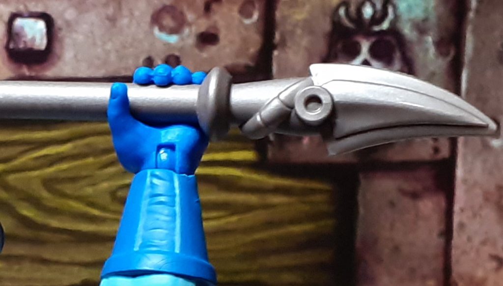The bottom of the Havoc Staff has a curved blade as shown in this close up photo.