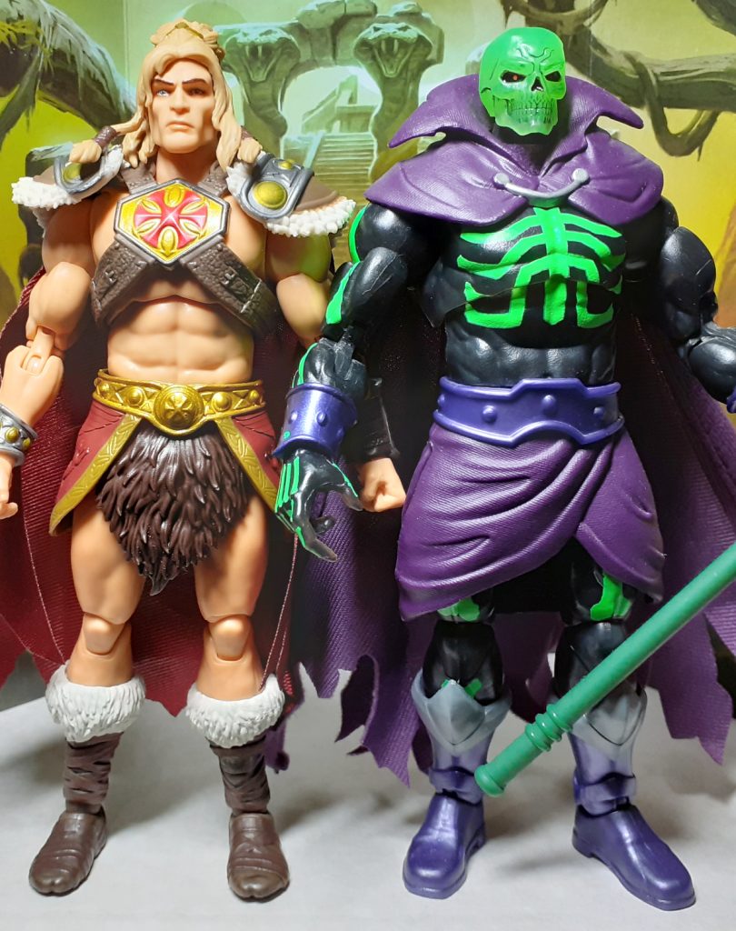 A side by side height comparison photo of the King Grayskull and Revelation Scare Glow figures. On the left of the photo is King Grayskull while on the right is Scare Glow.