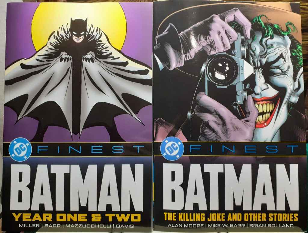 Two volumes of DC Finest Batman books. On the left is Batman Year One & Two while on the right is Batman: The Killing Joke and Other Stories.